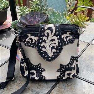 Black and white studded and embellished bag.